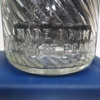 Jumbo Peanut Butter vintage clear glass jar with embossed elephant head: Embossed Back - Click to enlarge