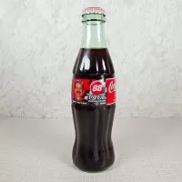 Dale Jarrett Nascar No. 88 Coca Cola Racing Family 1999 full 8 oz Coke Classic Bottle: Front - Click to enlarge