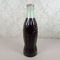 Scottsbluff Nebraska vintage 6 oz full hobbleskirt Coke bottle with red Coca Cola Classic cap: Right - Click to enlarge