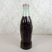 Scottsbluff Nebraska vintage 6 oz full hobbleskirt Coke bottle with red Coca Cola Classic cap: Back - Click to enlarge