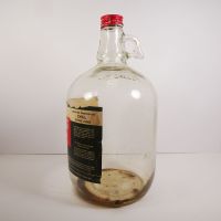 Vintage Coca Cola Coke fountain syrup thumb handle gallon glass jug with paper label and metal screw top: Left - Click to enlarge
