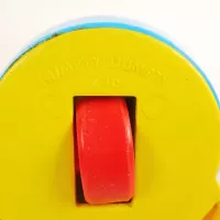 Vintage Fisher Price Humpty Dumpty pull toy with original yellow pull wire. Red hands spin when toy is pulled: Item Number - Click to enlarge
